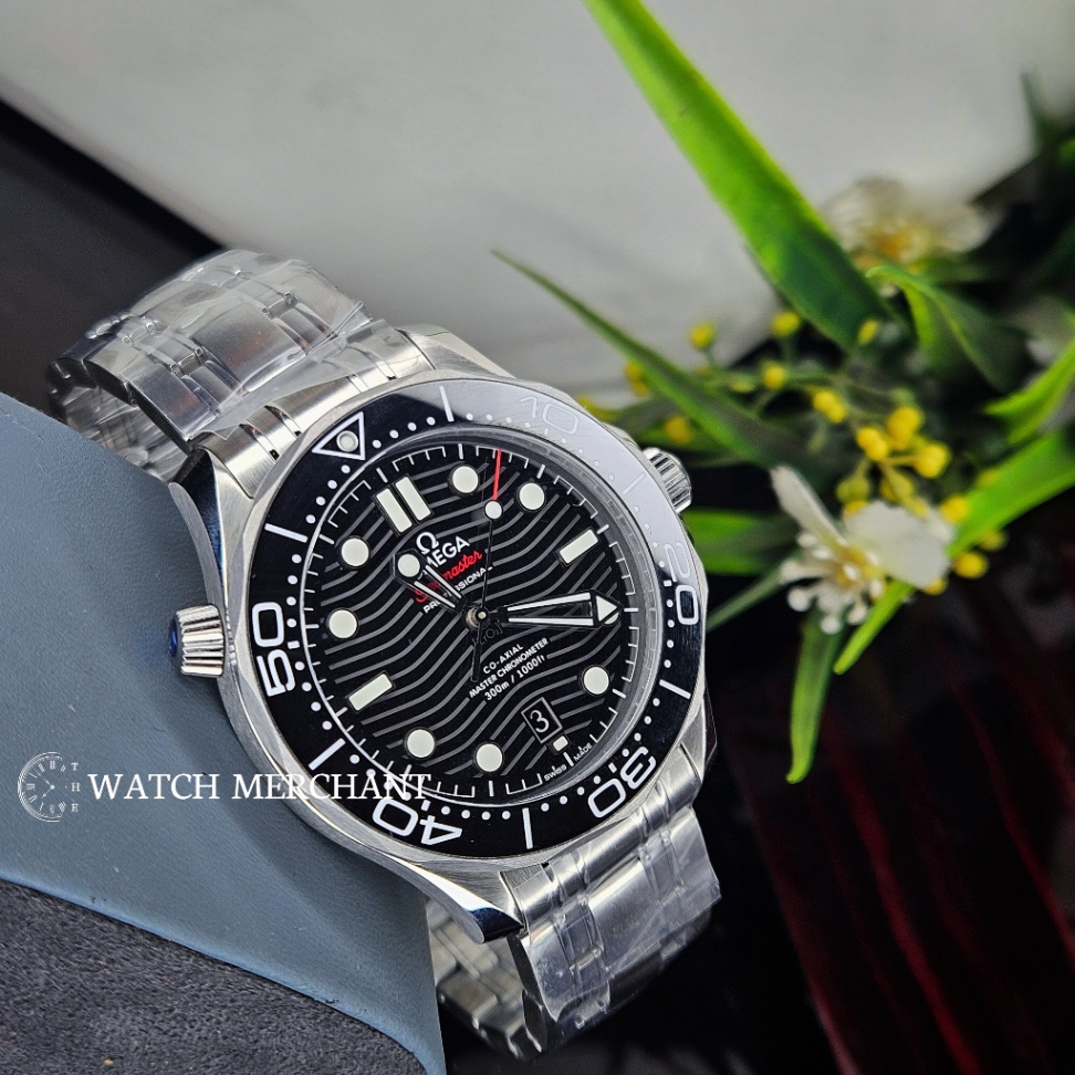 Omega Seamaster Diver 300M Stainless Steel Silver Case with Black Wave Dial, Black Bezel and Silver Bracelet