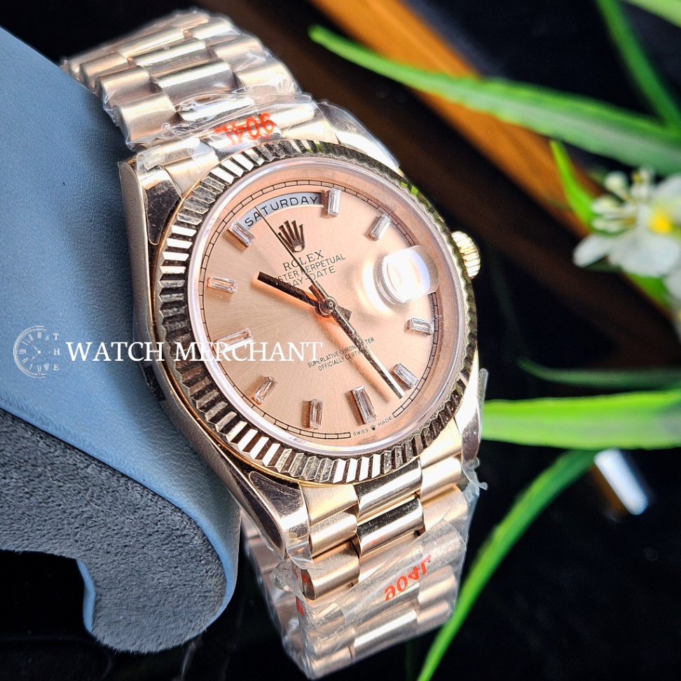 Rolex Day-Date Everose Gold Case with Pink Sundust Dial, Baguette Diamond Hour Markers, Fluted Bezel and President Bracelet