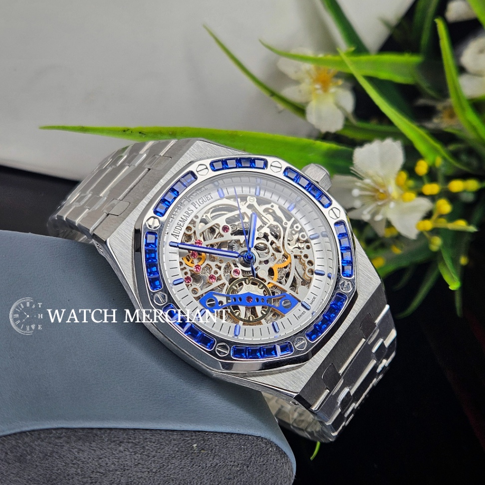Audemars Piguet Royal Oak Double Balance Wheel Openworked Stainless Steel Silver Case with Skeleton Dial, Blue Sapphire Bezel and Silver Bracelet